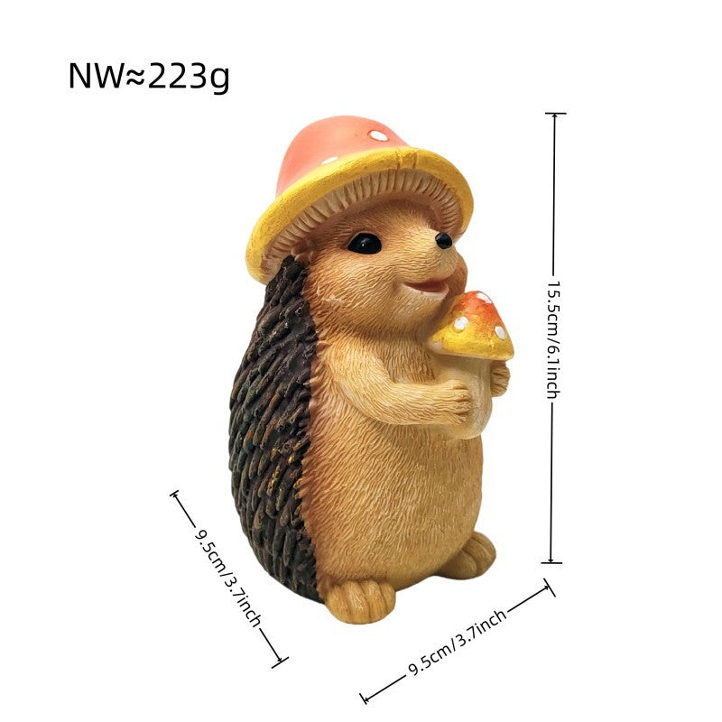 Niedliche Igel Skulptur mit Obst Karnz