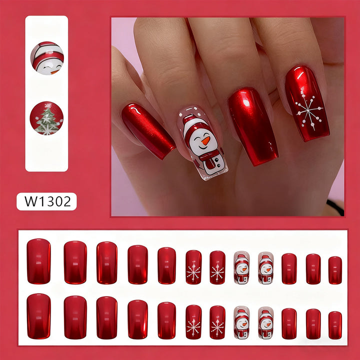 Kunstnagelset mit festlichem Schneemann-Design und Glitzerakzenten Karnz