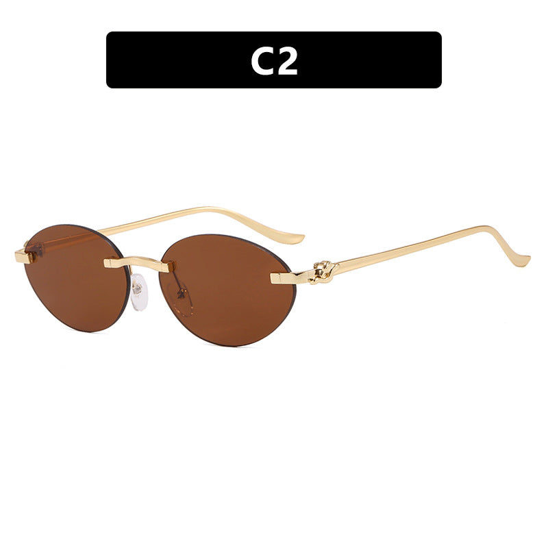 Damen elegante ovale Sonnenbrille mit goldenen Akzenten Karnz