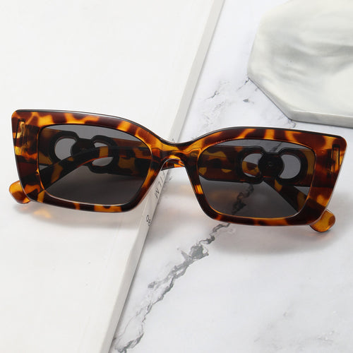 Damen Rechteckige Designer-Sonnenbrille mit luxuriösen Akzenten Karnz