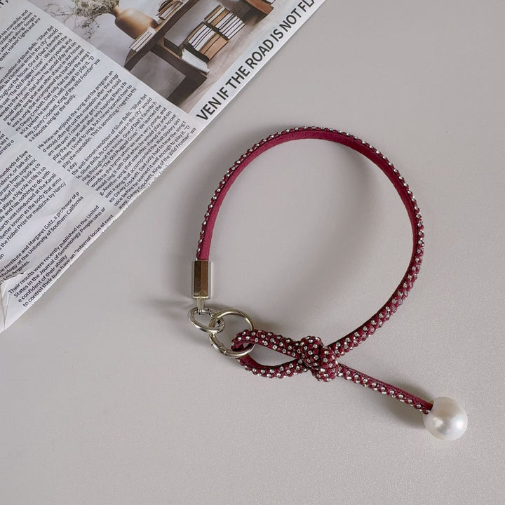 Elegante geknotte Perlenarmband-Band Karnz