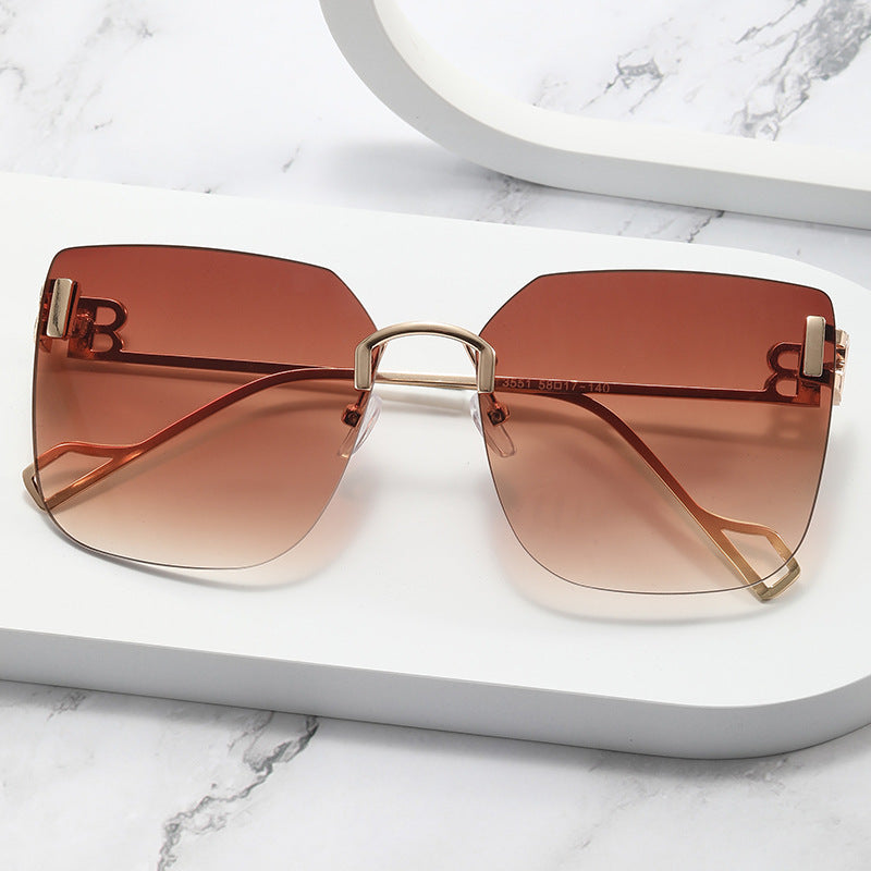 Damen elegante quadratische Sonnenbrille mit goldfarbenem Metallrahmen Karnz