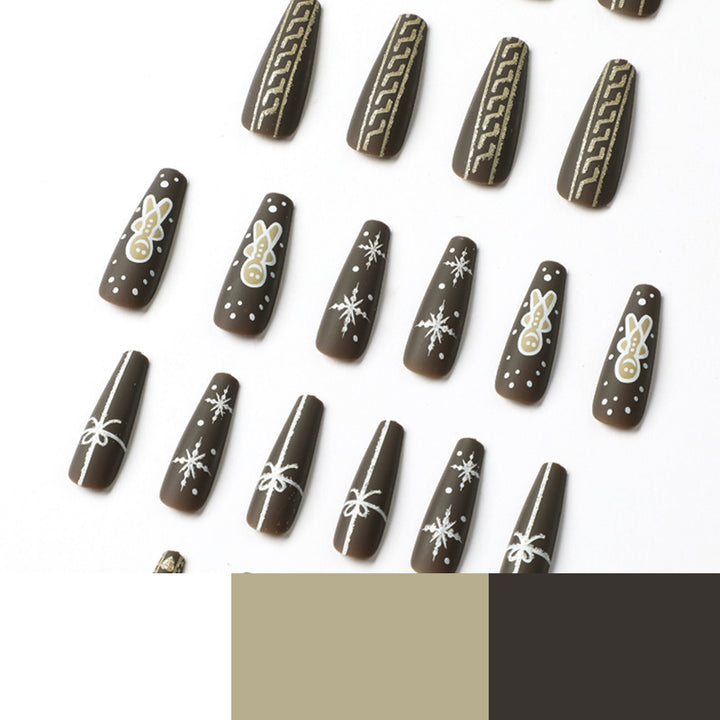 Künstliche Nagelkunst mit festlichem Lebkuchen-Design Karnz