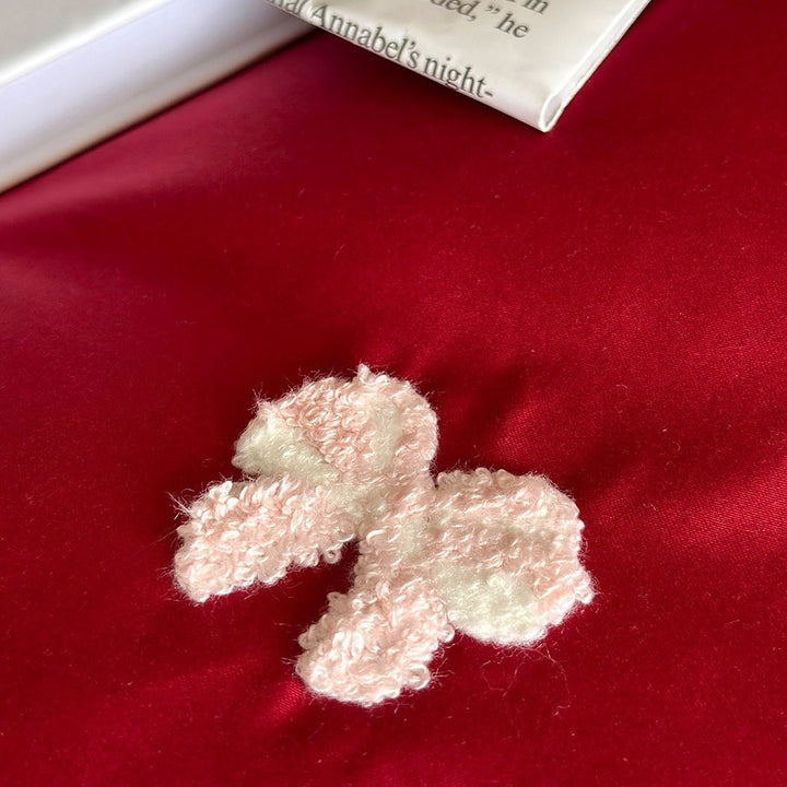 Luxuriöses Baumwollsatin-Bettwäsche-Set mit gestickten Schleifen und Rüschendetails