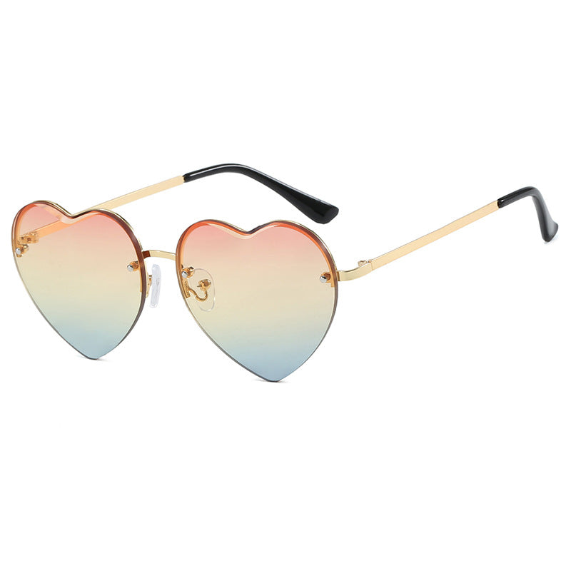 Damen Herzförmige Sonnenbrille mit verspiegelten Gläsern und modischem Metallrahmen Karnz