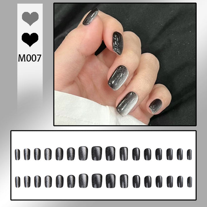 Kunstnagelset mit Glamourösem Ombre-Effekt und Glitzerverzierungen Karnz