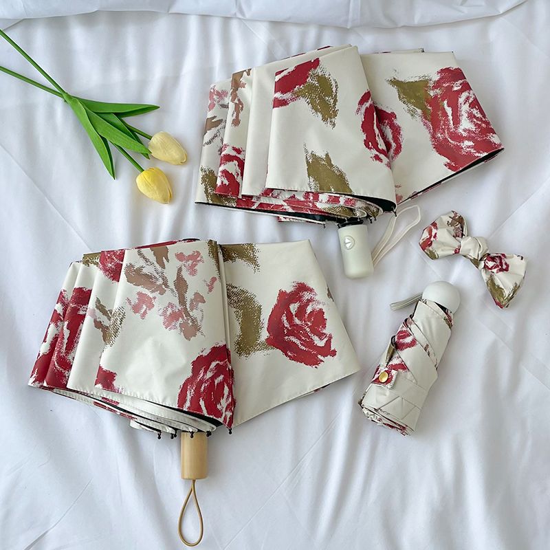 Damen Automatischer Faltregenschirm mit Blumenmuster Karnz