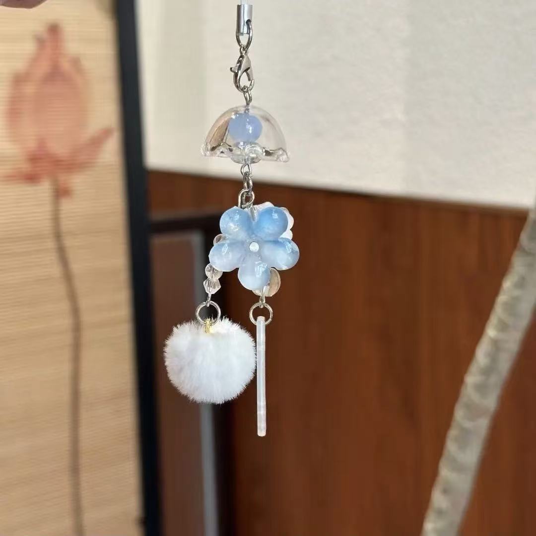 Dekorativer Blumen- und Pom Pom Charm Schlüsselanhänger Karnz