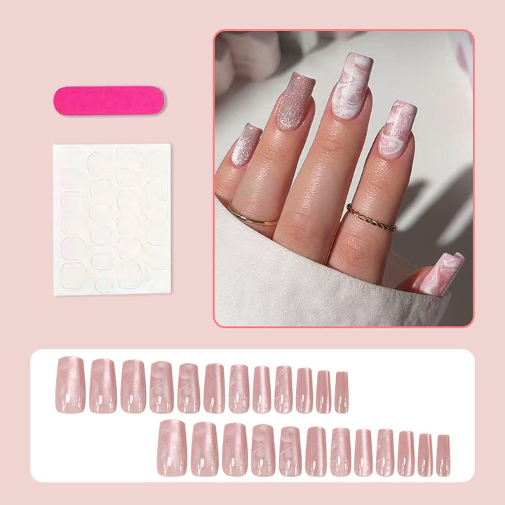 Kunstnagelset mit stilvollem Marmor-Design und Glitzerakzenten Karnz
