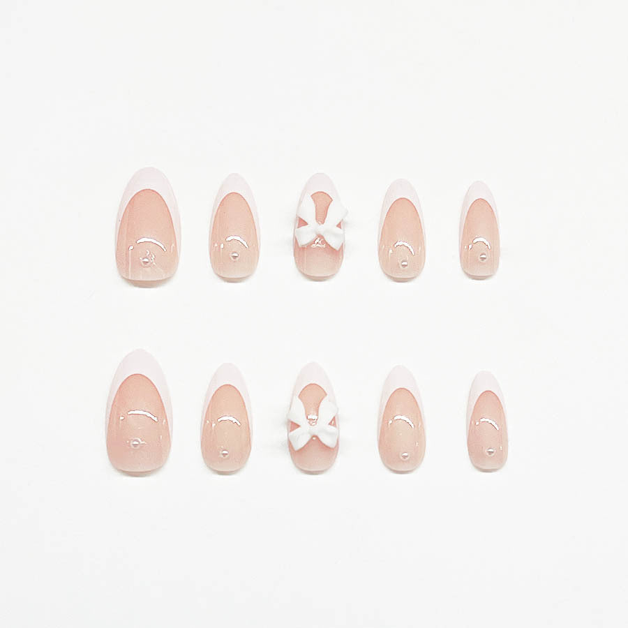 Kunstnagelset mit luxuriösen 3D-Schleifenverzierungen Karnz