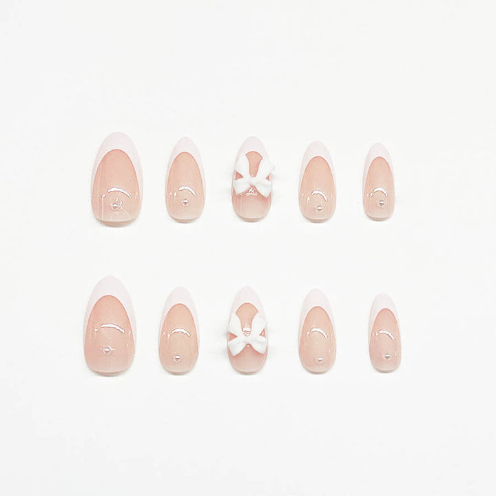Kunstnagelset mit luxuriösen 3D-Schleifenverzierungen Karnz