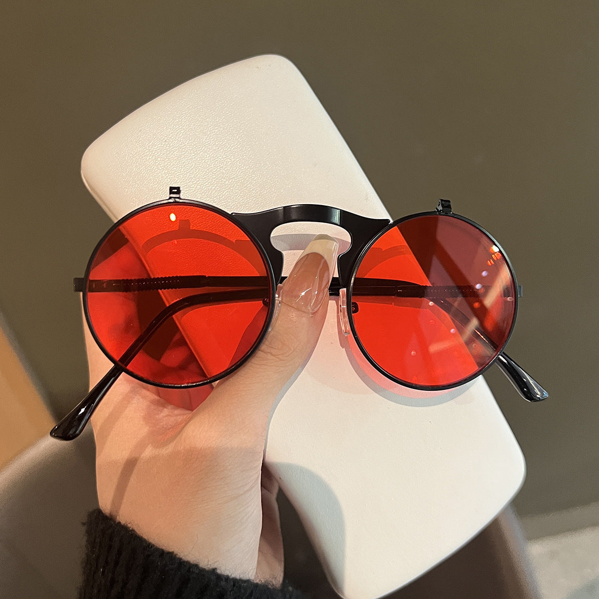 Damen Runde Designer-Sonnenbrille mit innovativem Rahmen Karnz
