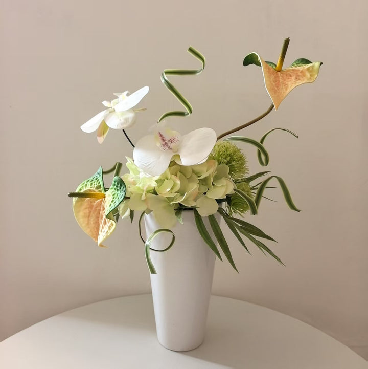 Elegante künstliche Blumenarrangement