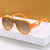 Damen Elegante Oversize-Sonnenbrille mit Designer-Details Karnz