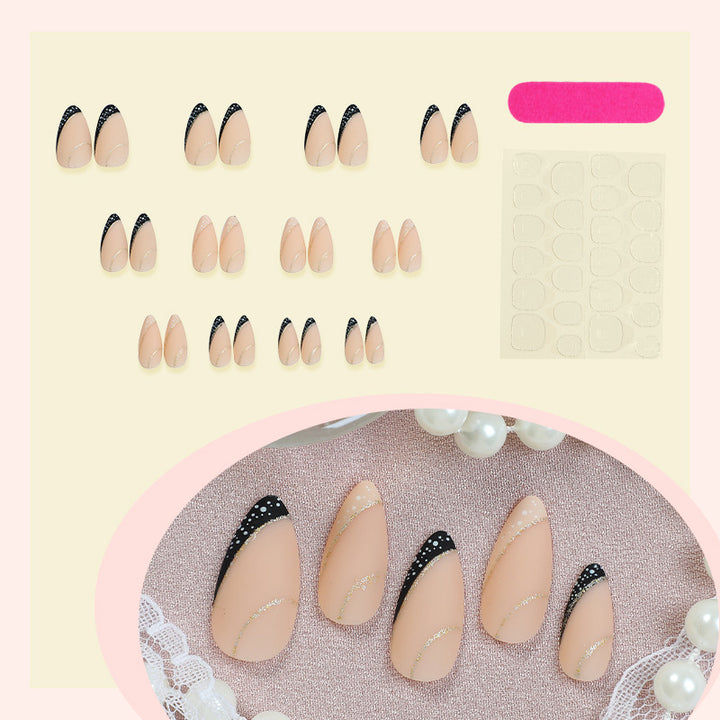 Stylisches Stiletto Press-on Nagelkunstset mit goldenen Akzenten Karnz