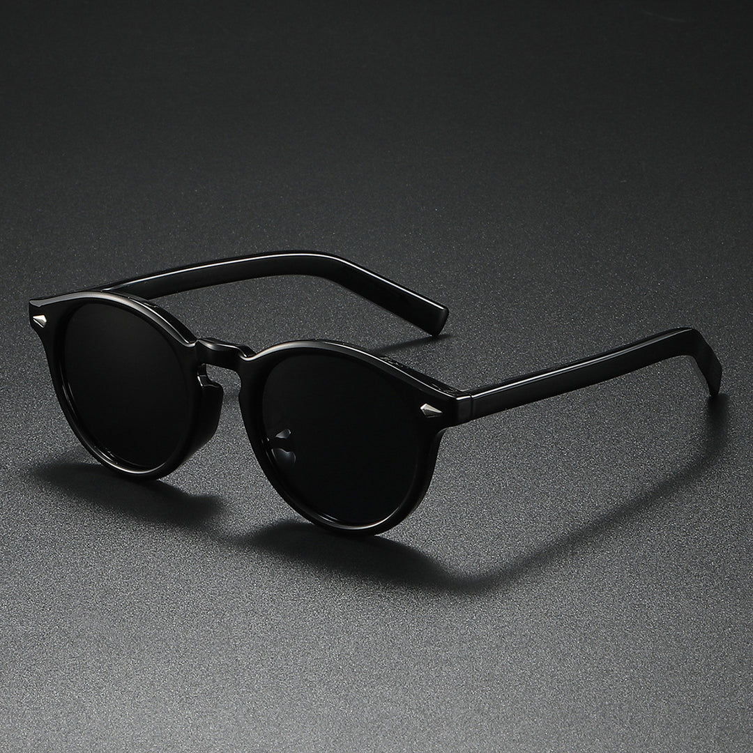 Damen Rund-Sonnenbrille mit transparentem Rahmen und reflektierenden Gläsern Karnz
