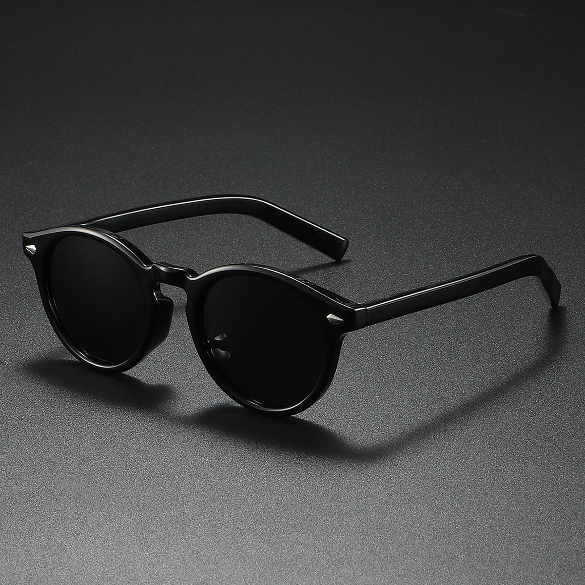 Damen Rund-Sonnenbrille mit transparentem Rahmen und reflektierenden Gläsern Karnz