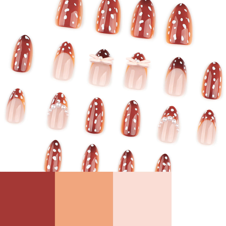 Künstliche Nagelkunst mit Punktmuster und Schleifenakzenten Karnz