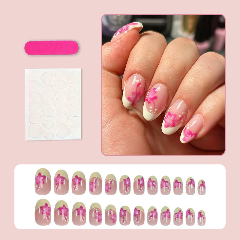 Kunstnagelset mit floralem Stil und eleganten Spitzen Karnz