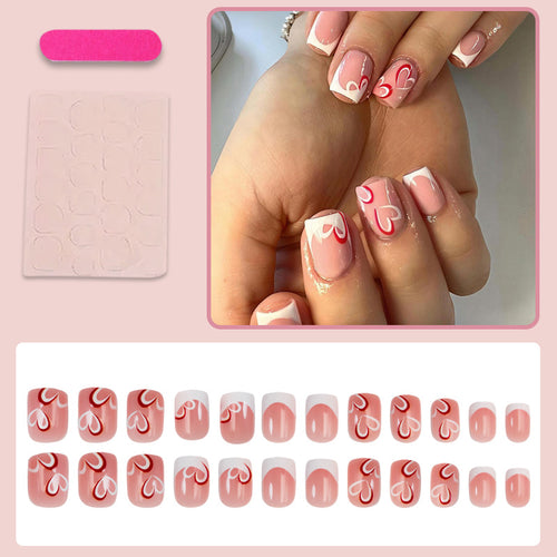 Kunstnagelset mit kunstvollen floralem Design und eleganten Details Karnz
