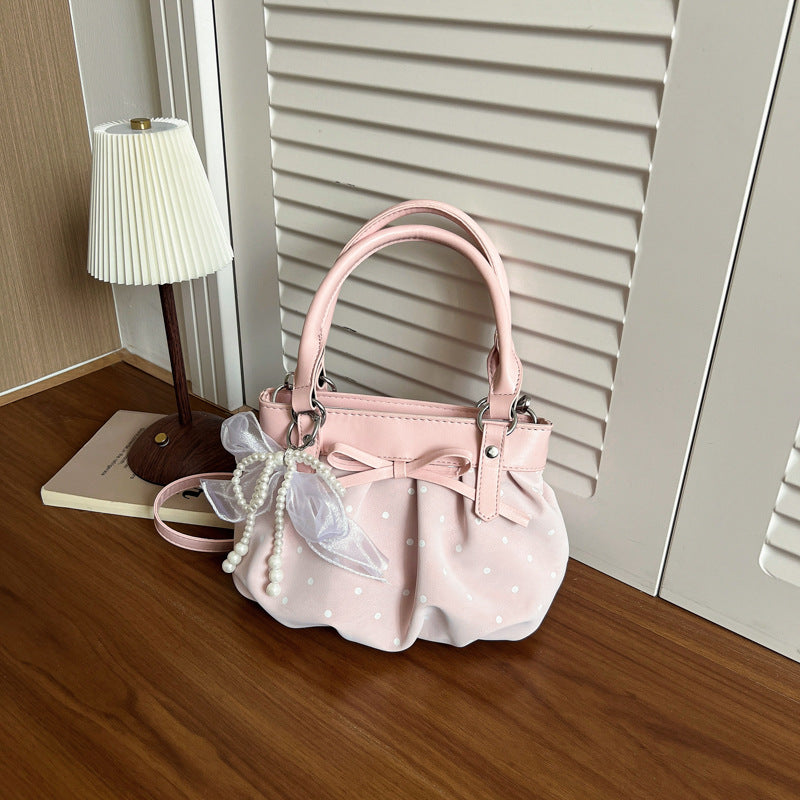Stylische Pünktchen-Handtasche