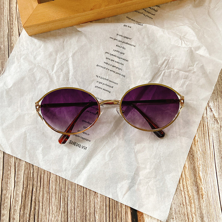 Runde Sonnenbrille mit Goldenen Akzenten Karnz