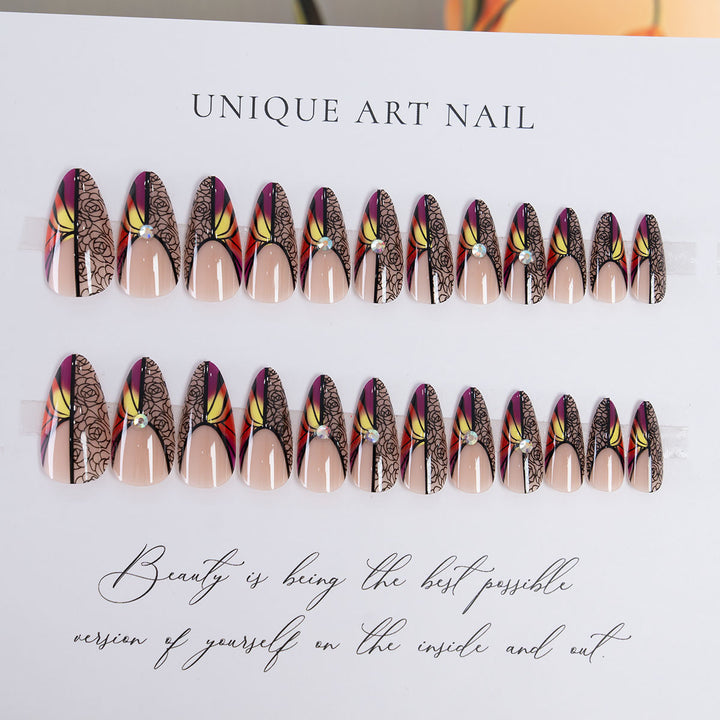 Künstlerisches Stiletto Press-On Nagelset mit floralem und abstraktem Design