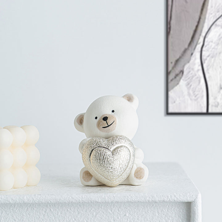 Kawaii Bärenfigur mit Herz Karnz
