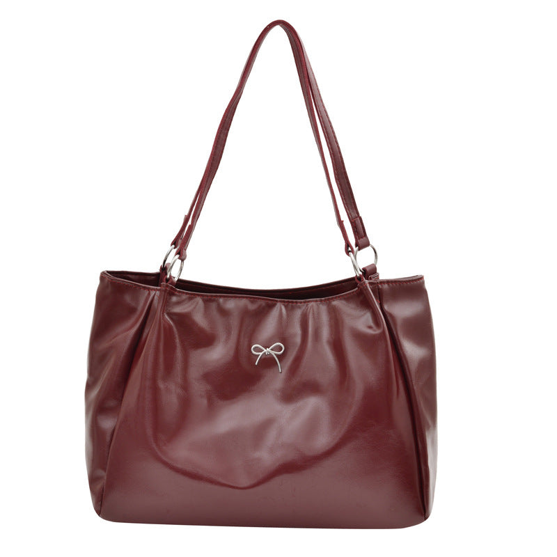 Schlanke zeitgenössische Schultertasche