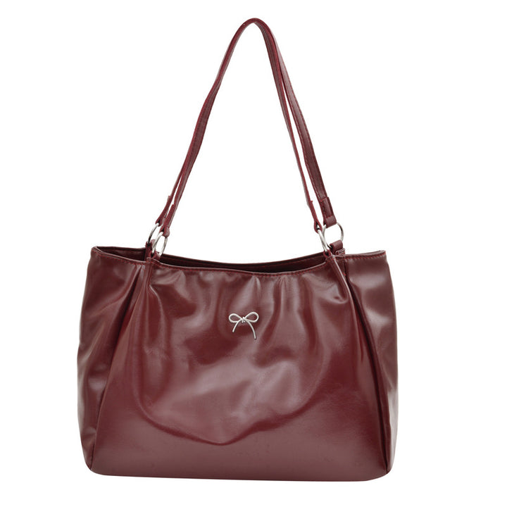 Schlanke zeitgenössische Schultertasche