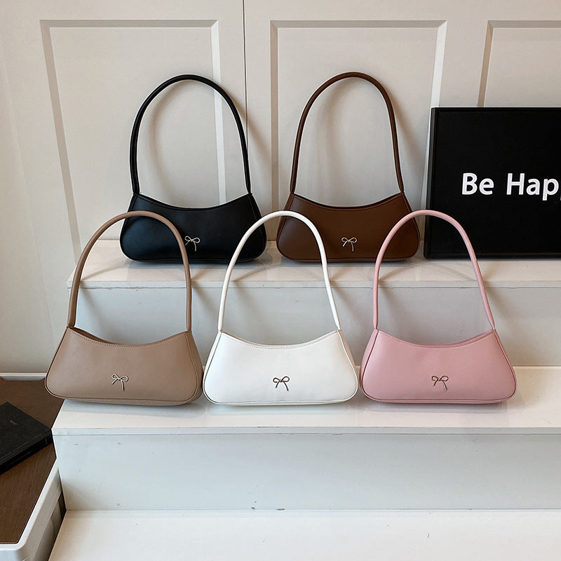 Elegante geschwungene Handtasche Karnz