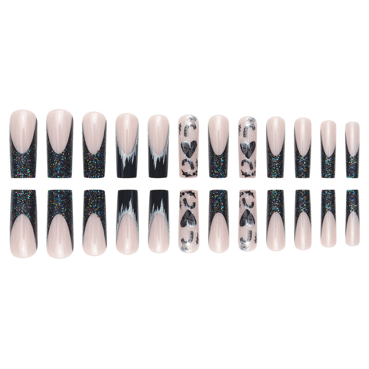 Künstlerisches Langes Stiletto Press-On-Nagelset mit Glitzer und Grafikdesign Karnz