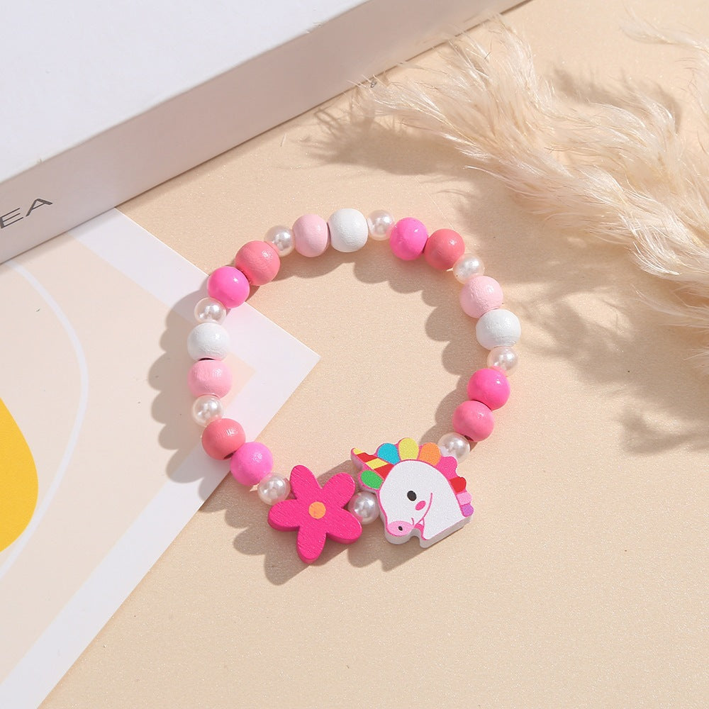 Verspieltes Kinderarmband mit Einhorn- und Blumenmotiv Karnz