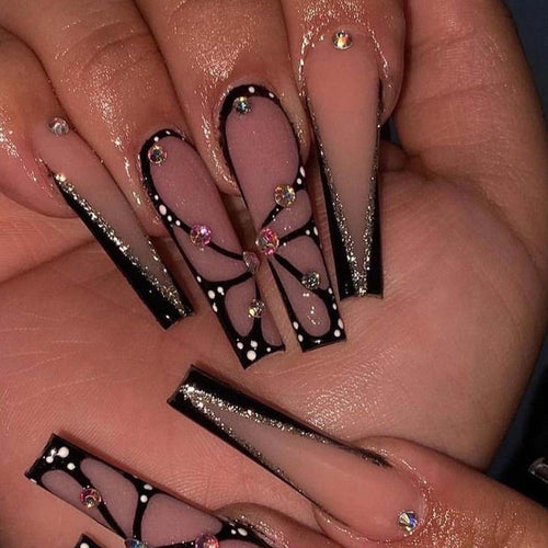 Kunstvolle Stiletto Kunstnägel mit Glitzer- und Schmetterlings-Motiv Karnz