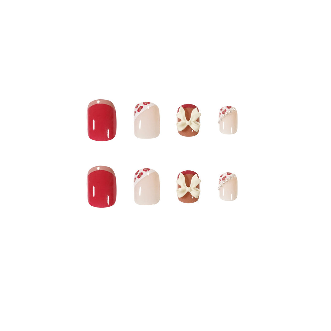 Kunstvolle Nagelkunst mit elegantem Schleifen-Design Karnz