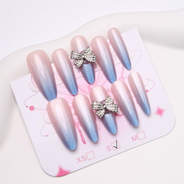 Elegante Stiletto Press-On Nägel mit Strassschleifen Karnz