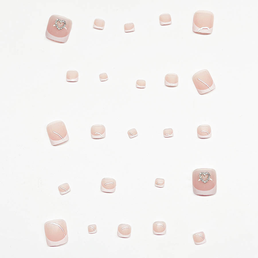 Kunstnagelset mit verspieltem Herzdesign Karnz