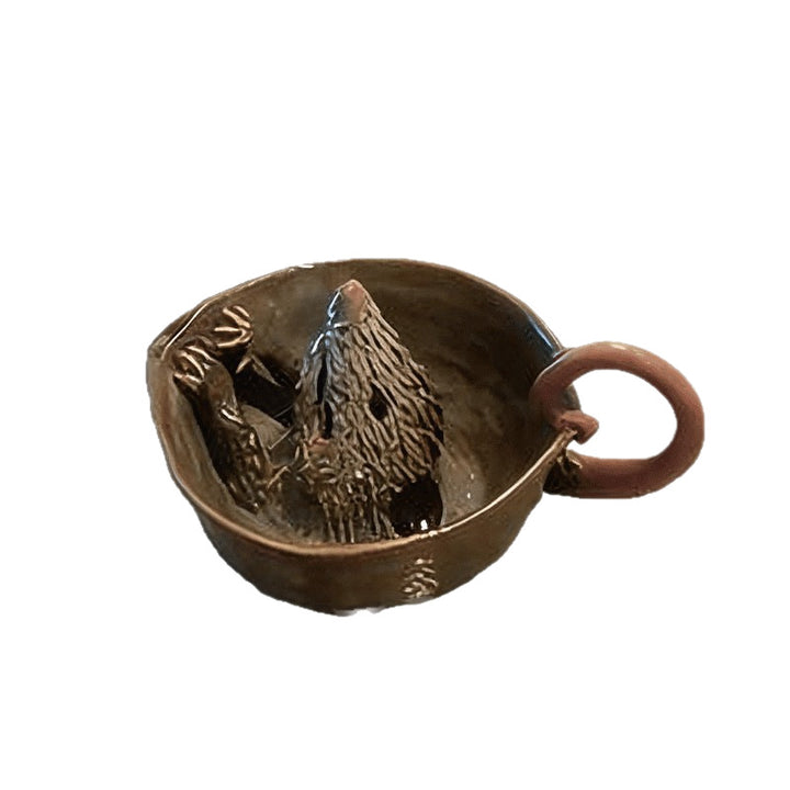 Dekorative Keramiktasse Karnz