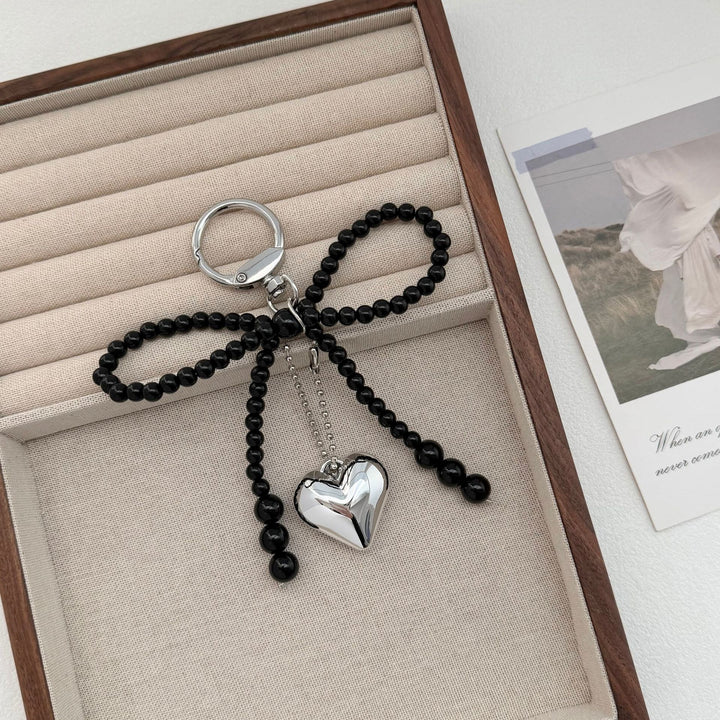 Eleganter Perlencharms-Schlüsselanhänger Karnz