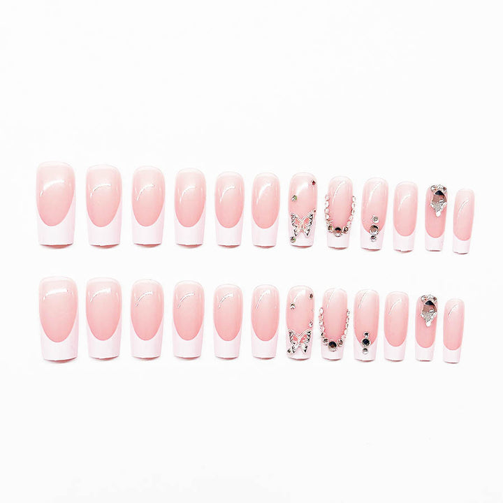 Kunstnagelset mit eleganten Strass- und Glitzerverzierungen Karnz