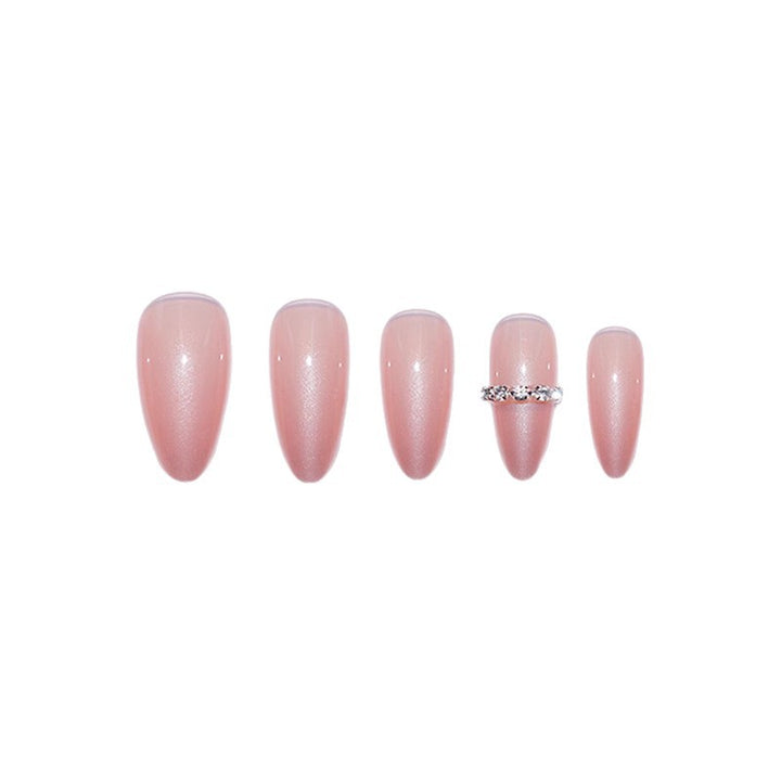 Elegante Stiletto Press-On Nagelkunst mit Edelsteinakzenten Karnz