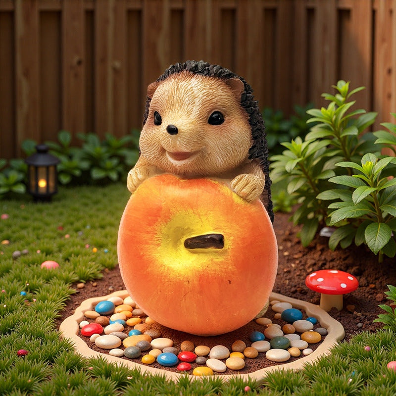 Niedliche Igel Skulptur mit Obst Karnz