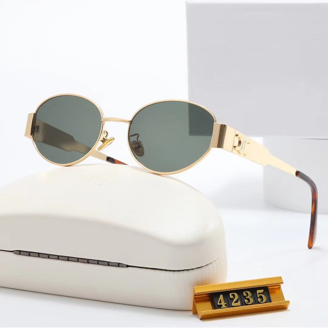 Damen elegante ovale Sonnenbrille mit goldfarbenem Rahmen Karnz