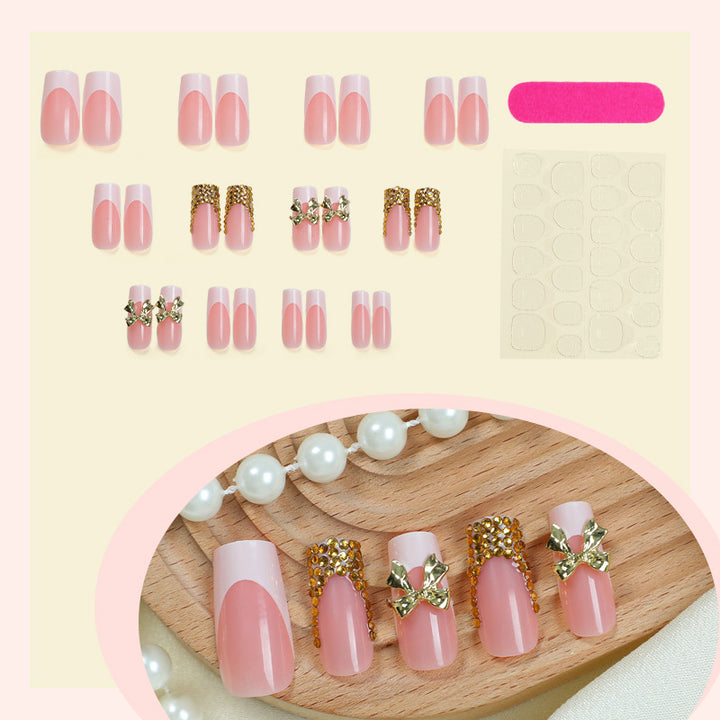 Dekoratives Press-On Nail Art Set mit elegantem Bogen und Edelstein-Akzenten Karnz