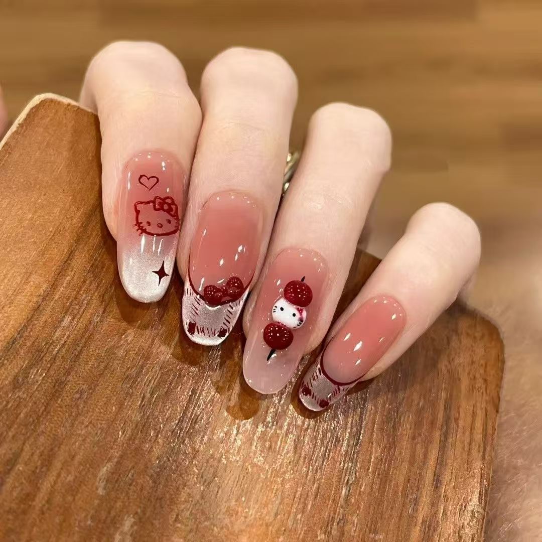 Niedliche themenbezogene Press-On Nagelkunst