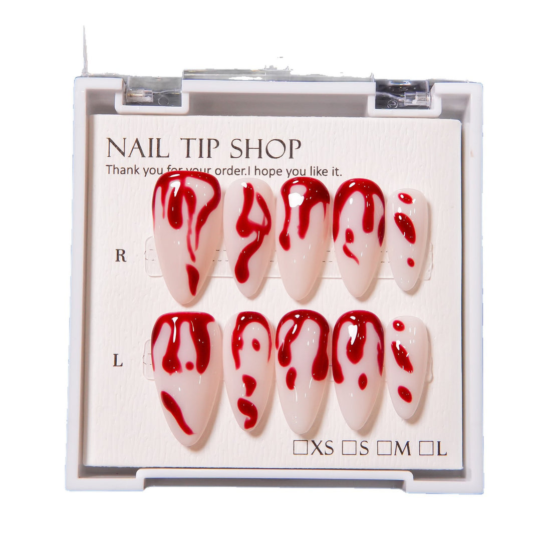Künstlerisches Press-On Nagelset mit Blutspritzdesign