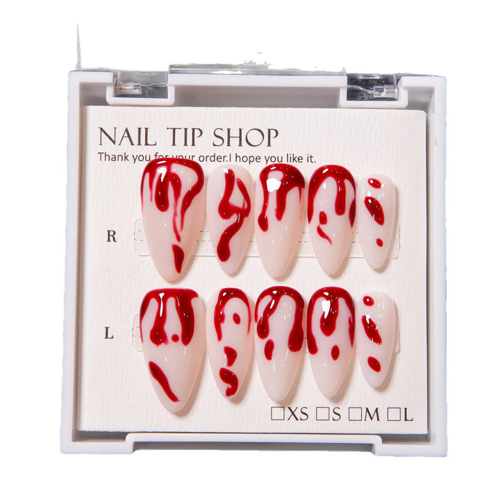 Künstlerisches Press-On Nagelset mit Blutspritzdesign