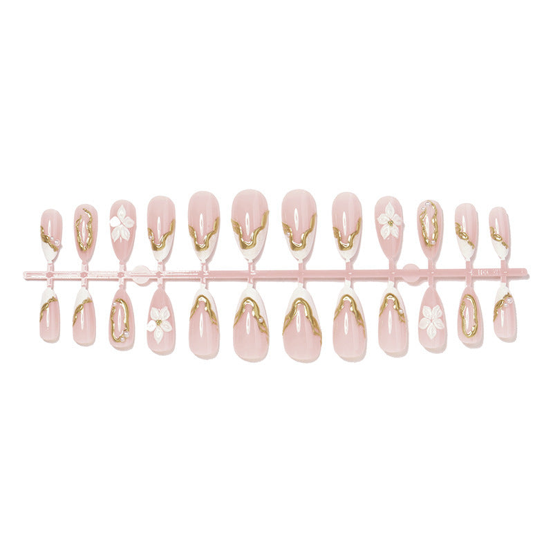 Kunstnagelset mit eleganter Blüten- und Glitzerverzierung Karnz