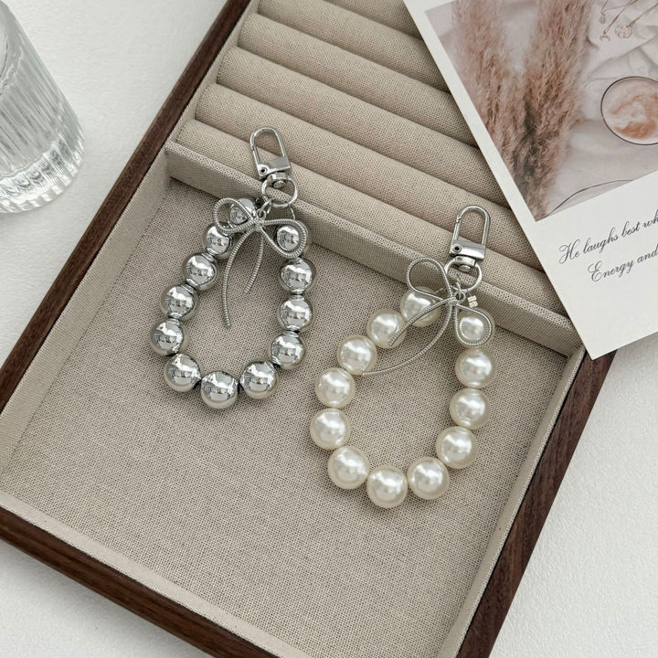 Eleganter Perlencharms-Schlüsselanhänger Karnz