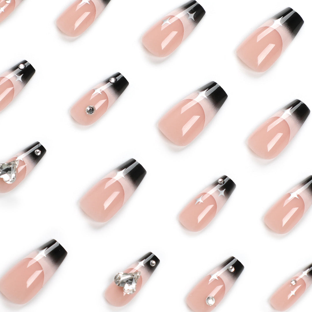 Künstliche Nagelverlängerungen mit elegantem Ombre-Design und Glitzerakzenten Karnz